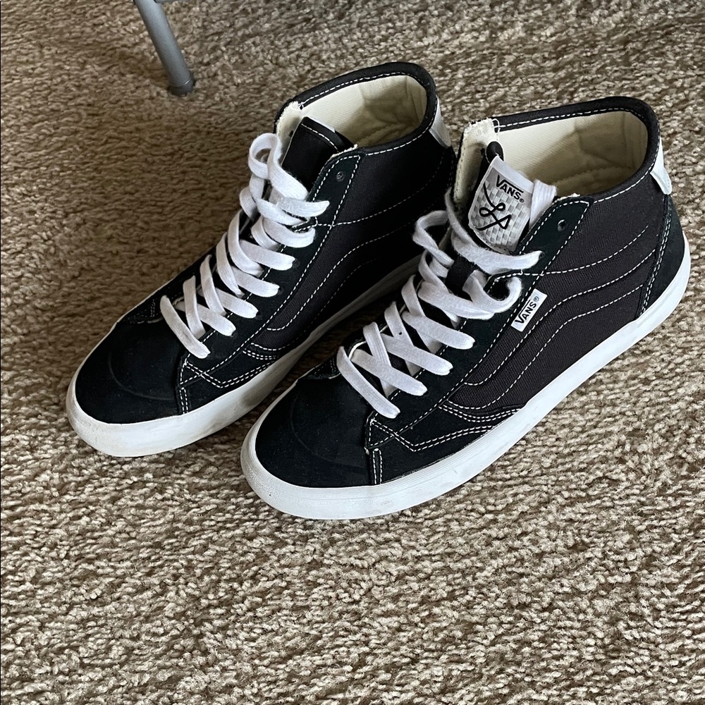 Vans Black and White High-Top Sneakers